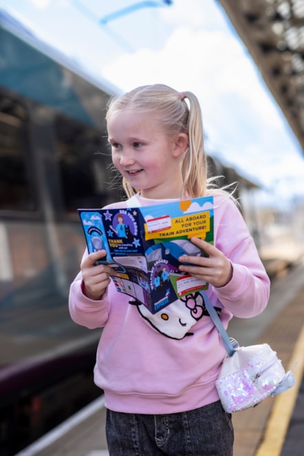 Lucy, 7, with the new TPE activity book