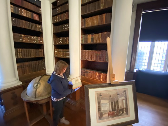 Georgian library: Leeds Museums and Galleries’ conservator Emma Bowron carrying out meticulous conservation work on the stunning library and its 500 books, some of which date from as early as the 1650s.