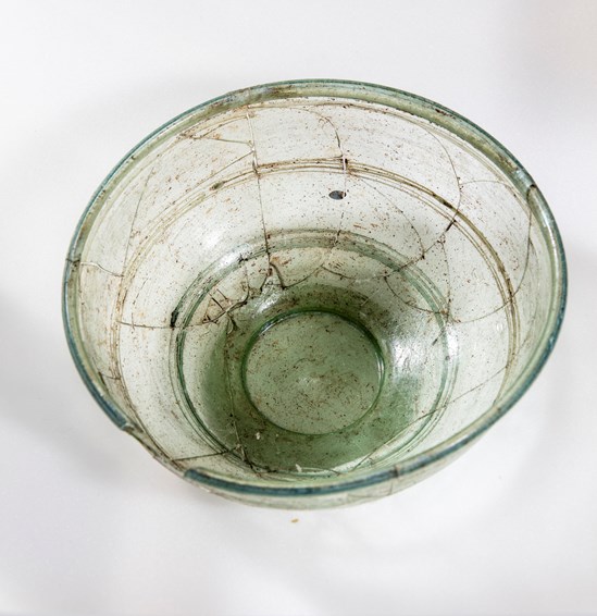 Glass bowl, possibly Roman, uncovered during HS2 excavations of an Anglo Saxon burial ground in Wendover: A tubular rimmed glass bowl found in a burial thought to be made around the turn of the 5th century and could have been an heirloom from the Roman era.

Tags: Anglo Saxon, Archaeology, Grave goods, History, Heritage, Wendover, Buckinghamshire