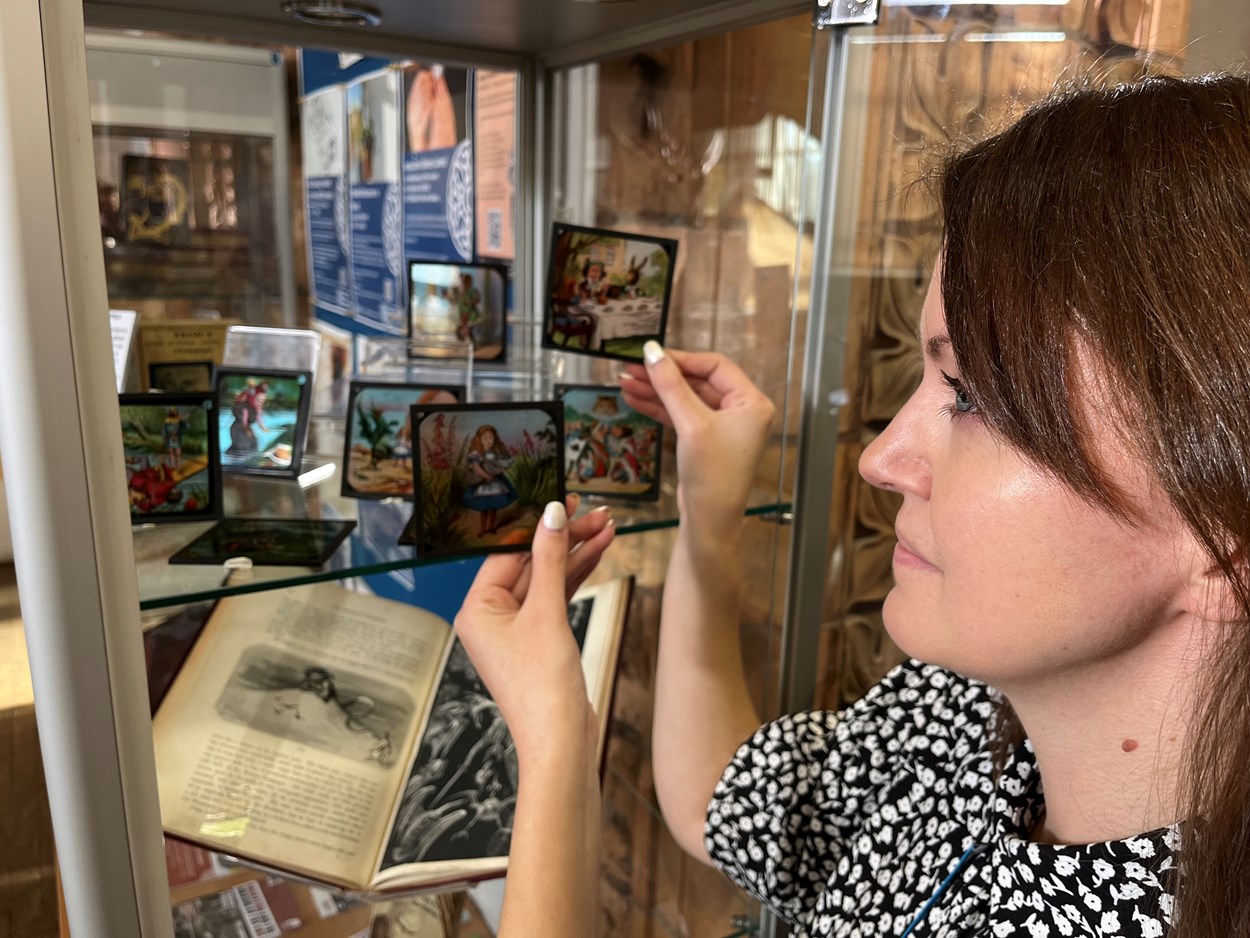 Magic lantern slides: Rhian Isaac, special collections librarian at Leeds Central Library, with the vintage magic lantern slides featuring moments from classic tales including Alice in Wonderland, Peter Pan and Aladdin.