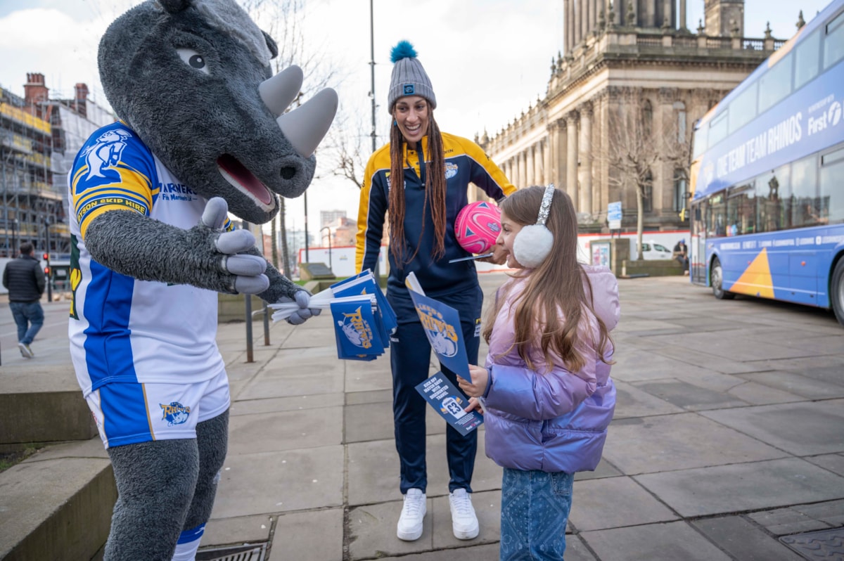 Ronnie The Rhino with Geva Mentor and young girl.