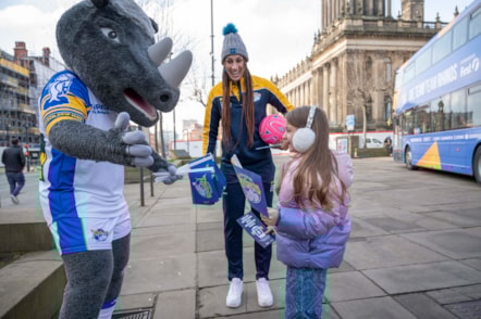 Ronnie The Rhino with Geva Mentor and young girl.