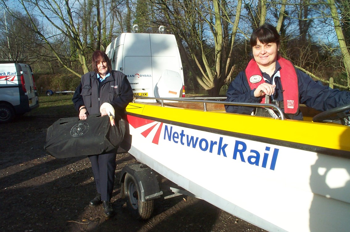 Wendy Hermon and Ellen Bryan with swan rescue boat: Wendy Hermon from Swan Lifeline and mobile ops manager Ellen Bryan with the donated swan rescue boat