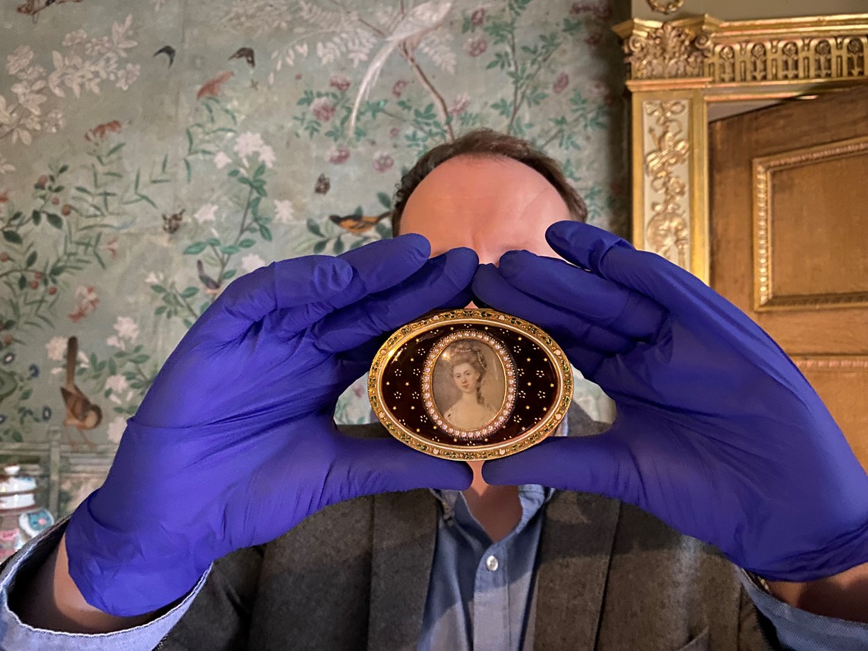 Temple Newsam snuff boxes: Adam Toole, keeper at Temple Newsam House with one of the stunning collection of snuff boxes which have returned to Temple Newsam 40 years after they were stolen by a mystery thief.