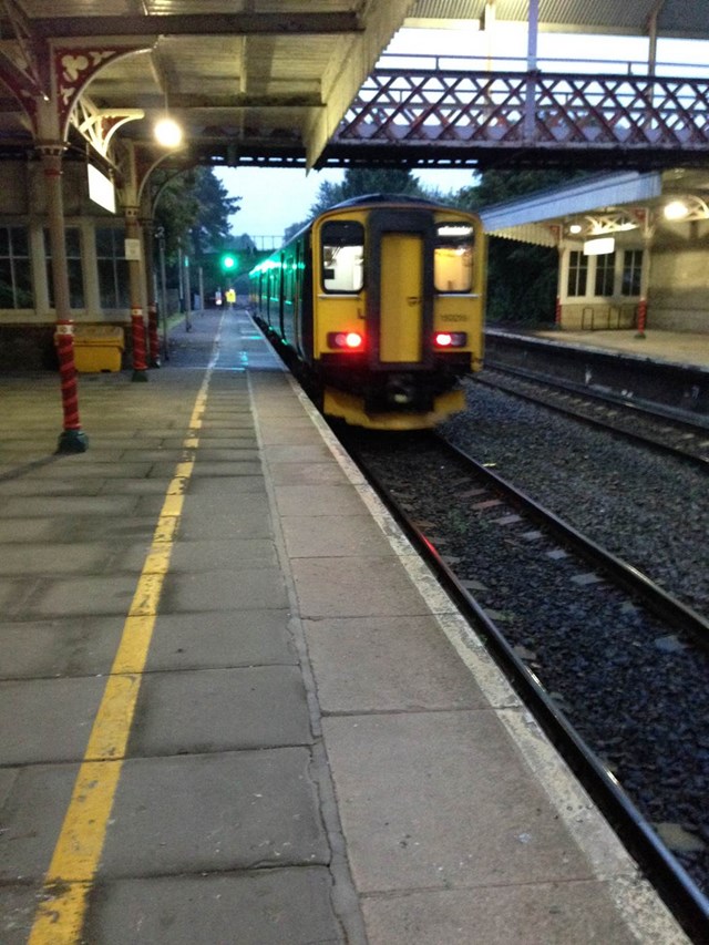 Completed Swindon to Kemble works - Kemble station: A train running on the upgraded Swindon to Kemble line (August 2014)