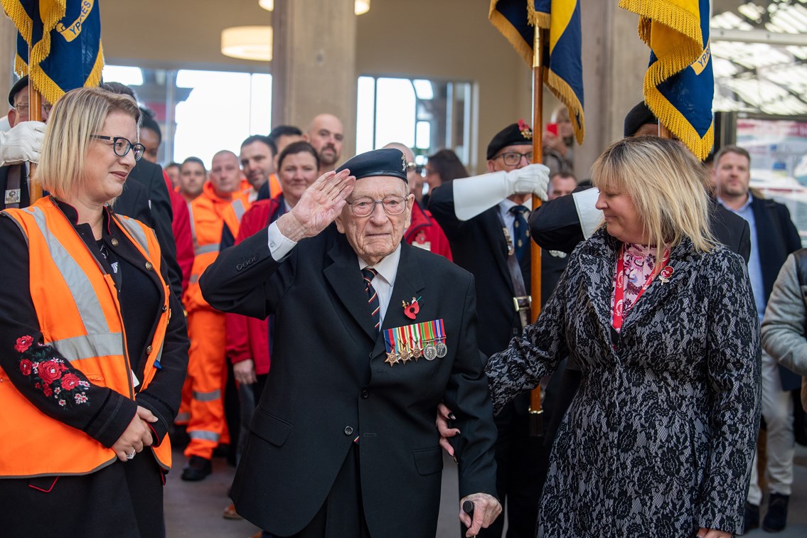 Ernest Horsfall saluting his guard of honour at Preston station
