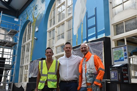 Rob Nelson, Benjamin Courtney, and Andy Pea in front of the beginning stages of 'The Creation of Hull'