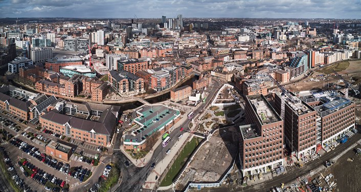 Panorama image of the city with the Meadow Lane development opportunity within the new Aire Park: Panorama image of Leeds City Centre with the focus to the front of the image of the part built Aire Park, new city centre park and the plot at Meadow Lane