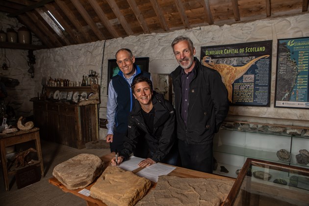 Minister signs NCO: L2R: SNH Operations Officer Alex Turner, MInister, Staffin Museum's Dugald Ross