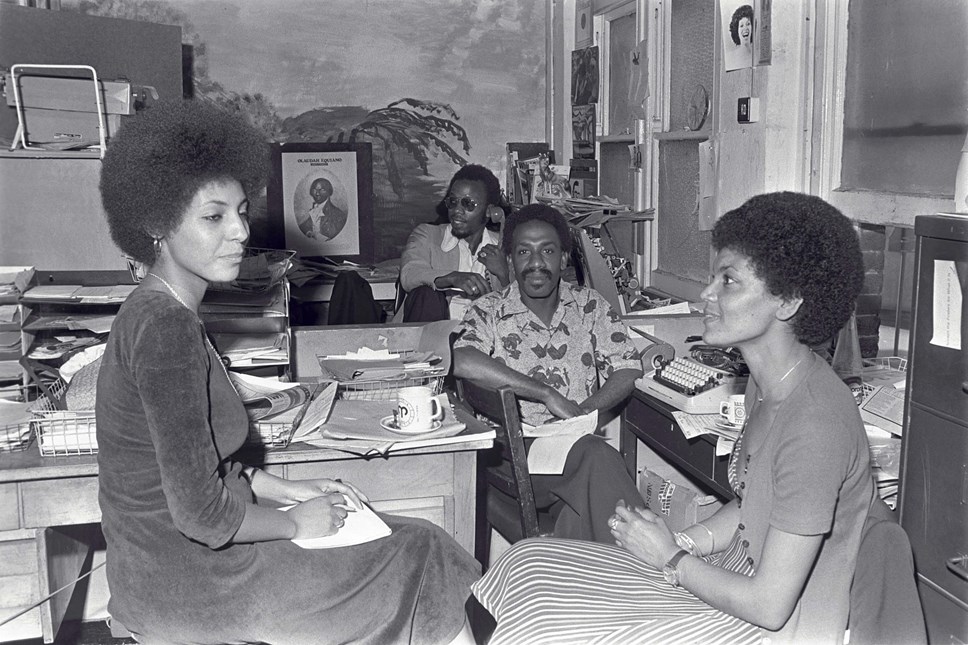 Caption: Tony Douglas (deputy editor) and Russell Pierre (editor) of the
West Indian World, the first national black newspaper in the
UK. They are interviewing journalist Leila Howe Hassan (left),
member of the Black Unity, Freedom Party and editor of Race
Today newspaper. She sits opposite her colleague Barbara
Beese (right), who was one of the Mangrove Nine and
member of the British Black Panthers.
Islington, c.1974