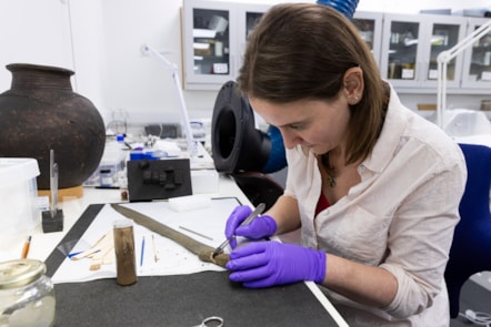 Conservator Bethan Bryan works on the Leadburn sword. Image © Duncan McGlynn (4)