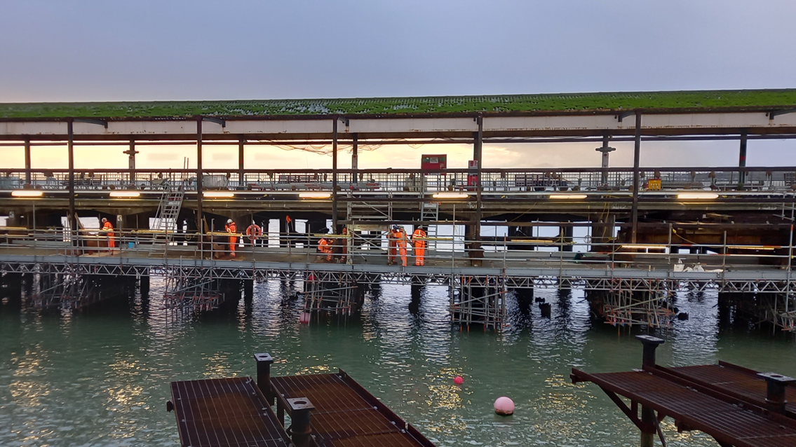 Work progresses to preserve and refresh the Island Line’s historic Ryde Pier on the Isle of Wight – with completion expected in late spring: Working on Ryde Pier