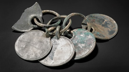 Bronze rattle pendant from the Peebles Hoard. Image © National Museums Scotland