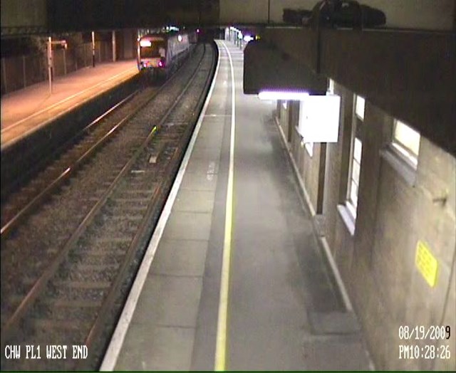 Youths attempt to train surf at Chalkwell station, Southend-on-sea