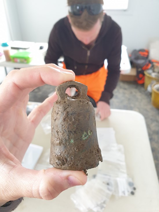 Bell uncovered during archaeological excavations at Fleet Marston, near Aylesbury, Buckinghamshire.: Bell uncovered during archaeological excavations at Fleet Marston, near Aylesbury, Buckinghamshire. Excavations took place during 2021.

Tags: Archaeology, Heritage, Roman artefacts, History, Excavations