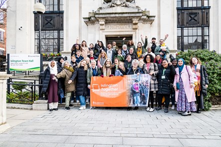 Some of the women and men who joined the Islington Together Women's Walk, on the steps of Islington Town Hall