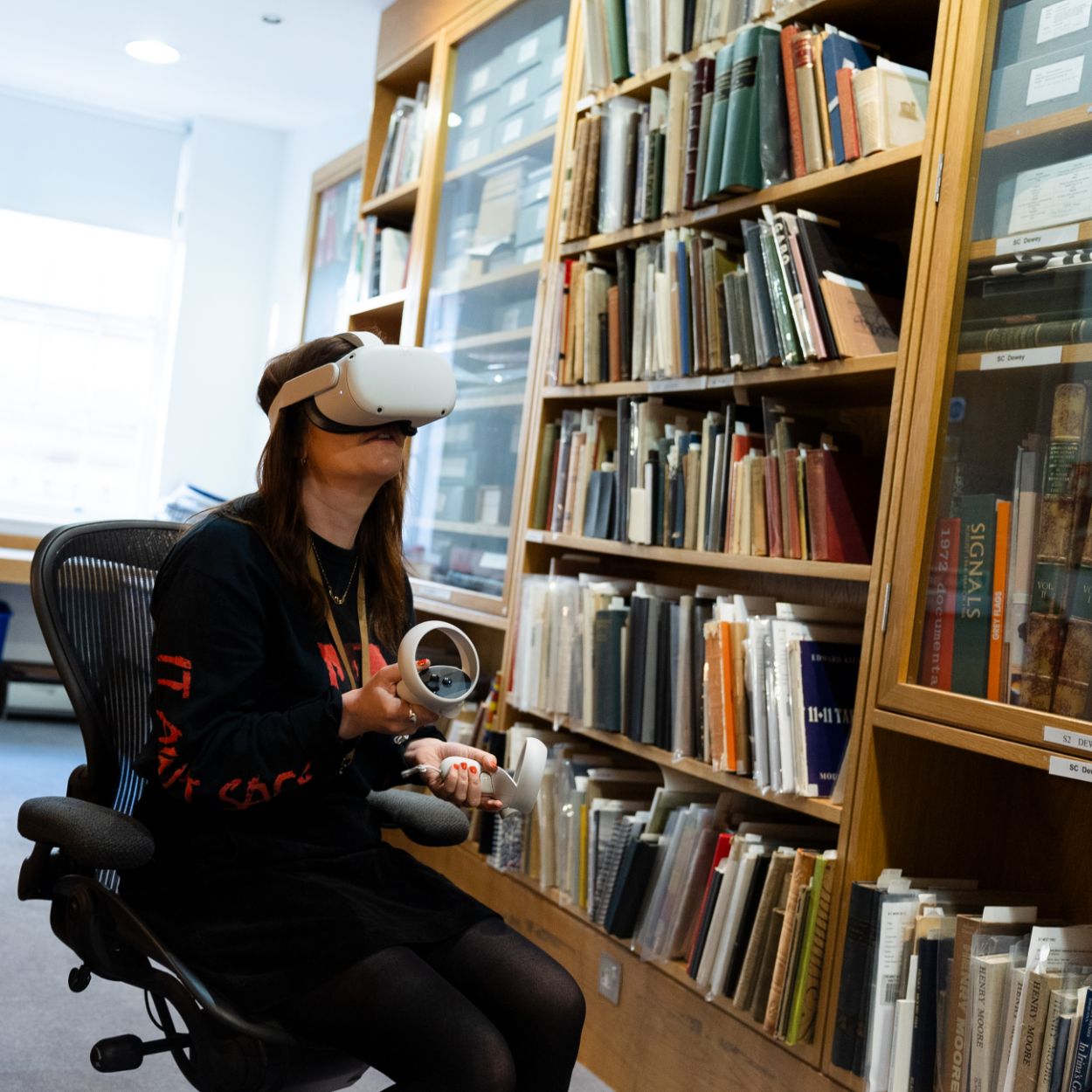 Neville Street VR: Errin Hussey, an archivist with Leeds Museums and Galleries tries out the newly digitised, VR version of A Light and Sound Transit by Berlin-based artist, sound sculptor and composer Hans Peter Kuhn.