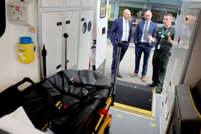 Operations manager Darren Green and Chief Executive Kev Scollay show Sir Jim Mackey around a new electric vehicle (2)
