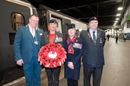 (Left to Right): Robert Gosling (Avanti West Coast Customer Service Team Leader), Vicky Lawson (Royal British Legion Poppy Appeal Manager for East Cheshire), Shelly Gascoigne (Royal British Legion) and Steve Barker (Royal British Legion) with the full poppy wreath at London Euston