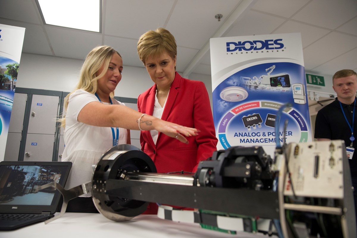 Diodes apprentice Caitlin Kirk with the First Minister