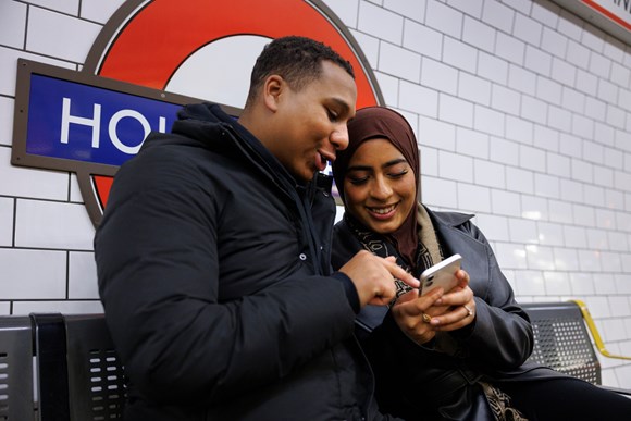 TfL Press Release - Three more London Underground stations begin offering high-speed mobile coverage to customers with three more going live in the next week: TfL Image - Passengers using mobile on Holland Park platform