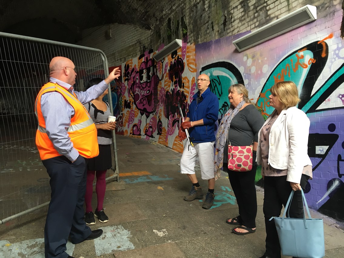 Network Rail showcases transformation of Swansea subway as part of artist-led community scheme: Julie James AM being briefed by Network Rail on new lighting scheme