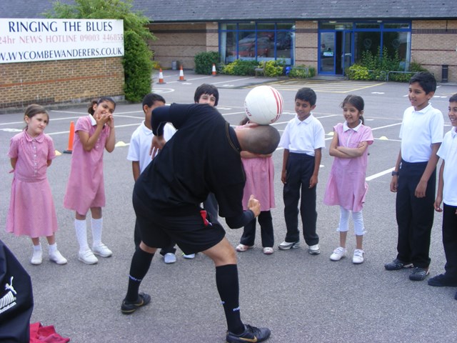 Football freestyler Colin Nell (2): Colin Nell, Network Rail's resident football freestyler, wows the kids with his skills.