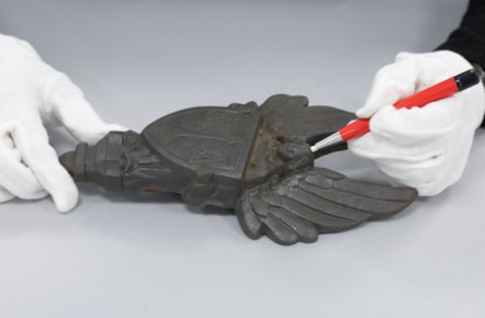 Cast iron angels carryings shields designed by Alice Meredith Williams.  Image (c) Neil Hanna (4)
