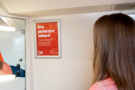 Brightly coloured posters displayed onboard Avanti West Coast trains advise how customers can request free period care when in need.
