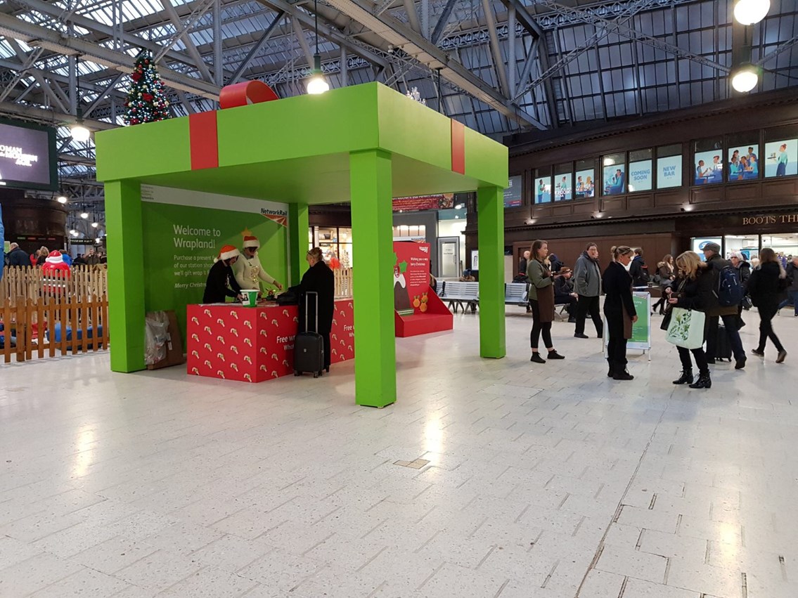 Network Rail has Christmas wrapped up for station shoppers: Wrapland - Glasgow Central booth