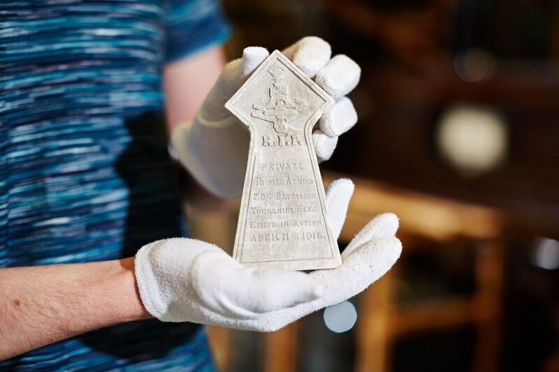 The Preservative Party: One of the objects selected for display by the Preservative party. The plaque is made out of chalk and is believed to have been fashioned by Private N.Nelson, a serviceman who fought in the trenches during the First World War.
The inscription on the plaque says it was made in memory of Private Thomas Atkins of the 20th Battalion Yorkshire Regiment, who was killed in 1916.