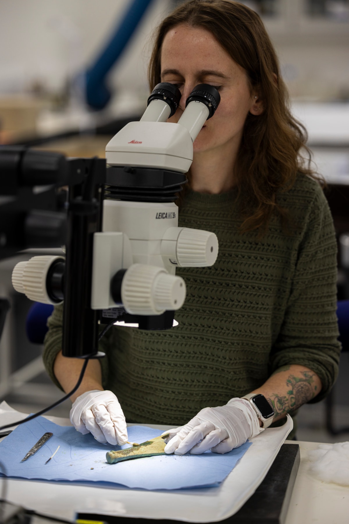 Conservator Bethan Bryan works on the Peebles Hoard. Photo © Duncan McGlynn (5)