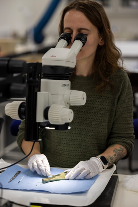 Conservator Bethan Bryan works on the Peebles Hoard. Photo © Duncan McGlynn (5)