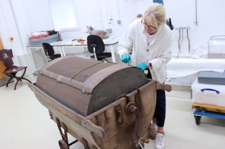 Curator Jenny Truran cleans cheesemaker 2