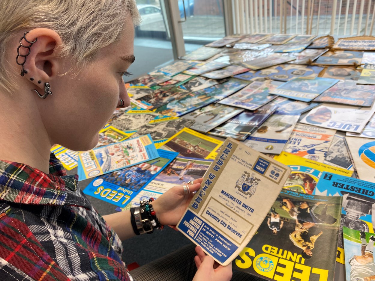 LUFC programme donation: Amy Thraves-Connor has been working on a placement with Leeds Museums and Galleries, scouring through boxes of the donated programmes, searching for those which help tell both the story of the club and how the team has influenced life in Leeds both on and off the pitch.