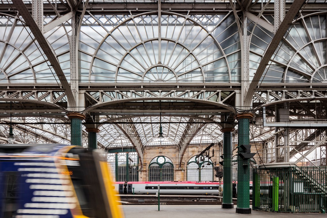 Glasgow Central - platform and structure with speeding train: Glasgow Central
railway station
train station