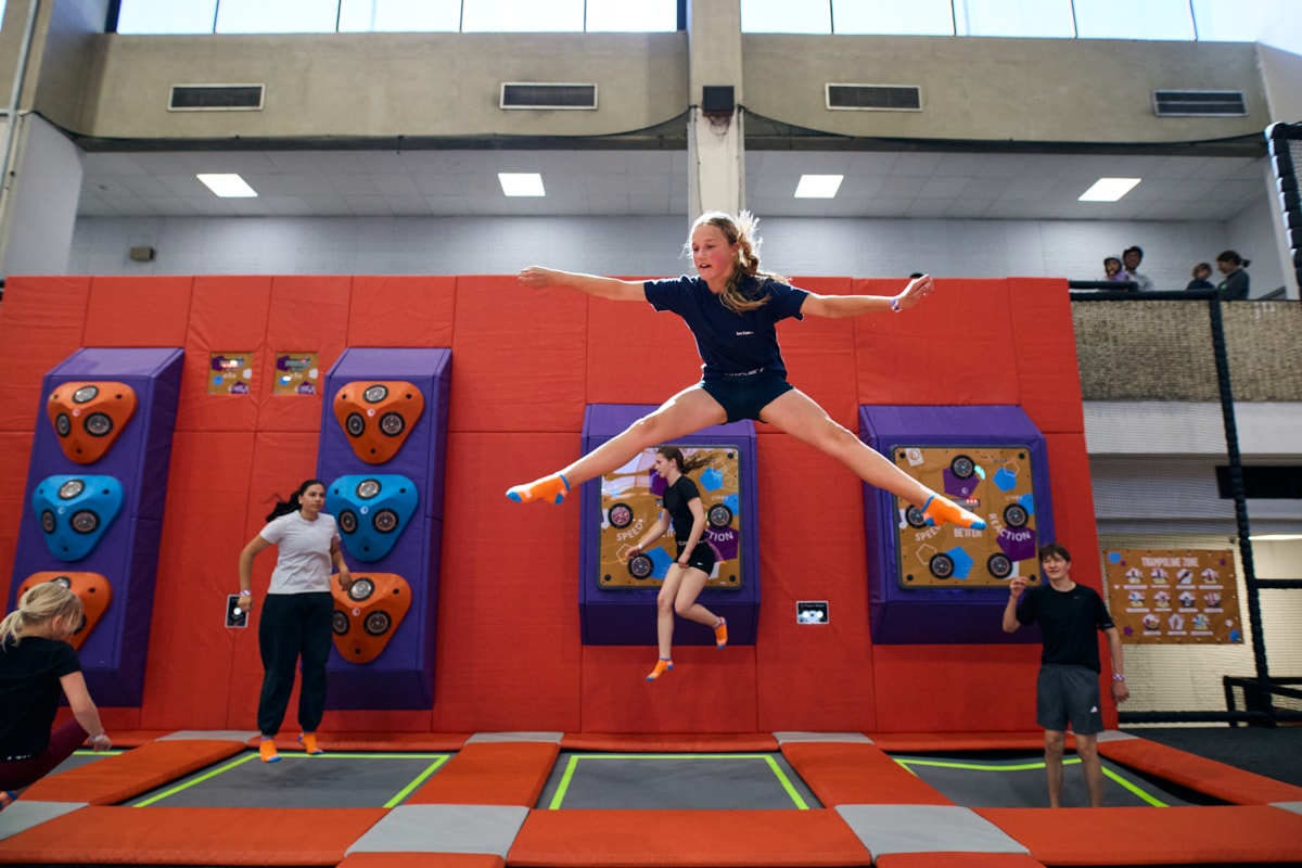 Young people using the trampoline zone at the new Sobell Leisure Centre