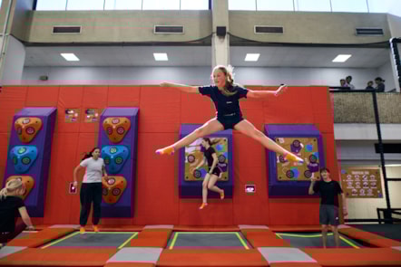 Young people using the trampoline zone at the new Sobell Leisure Centre