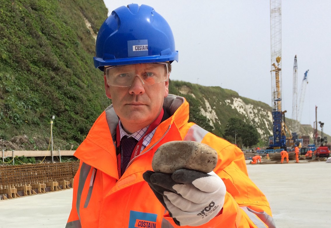 Dover and Deal MP Charlie Elphicke with a rock thrown by yobs: Dover and Deal MP Charlie Elphicke with a rock thrown by yobs from the clifftop at workers on the site below