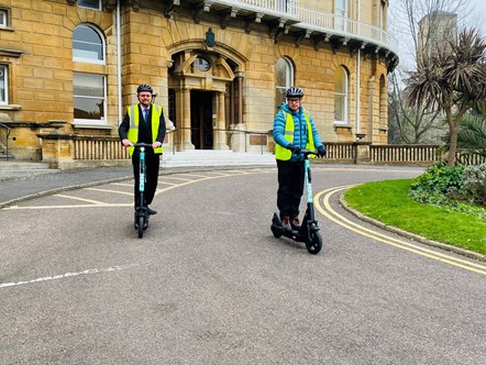 Beryl Field Operations Manager, Martin Jolly and Councillor Mike Greene, BCP Council’s portfolio holder for Transport and the
Environment, outside of BCP Town Hall marking the first anniversary of the e-scooter scheme.