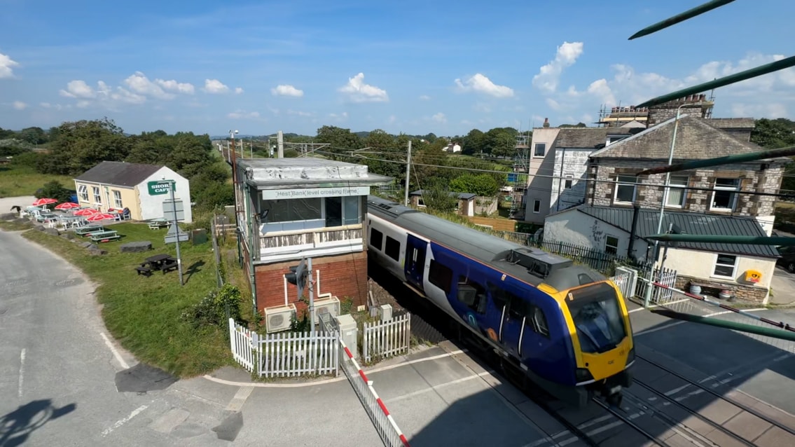 Northern train passing by Hest Bank signal box-2