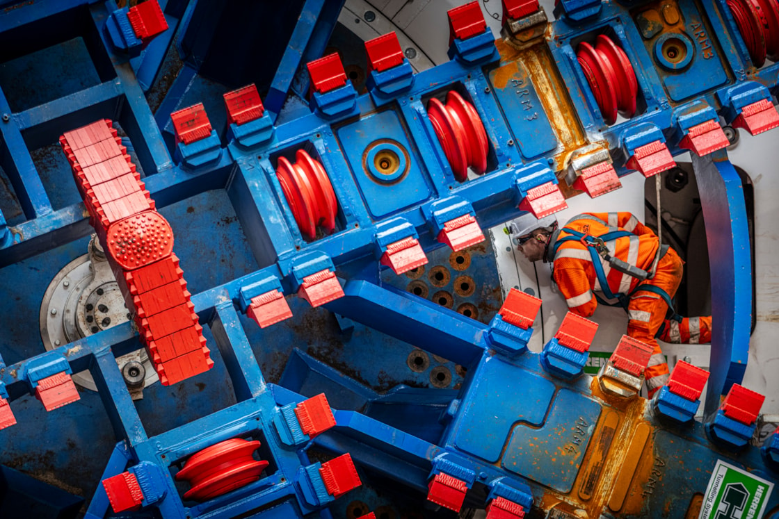 TBM cutterhead madeleine being installed by worker in OOC box