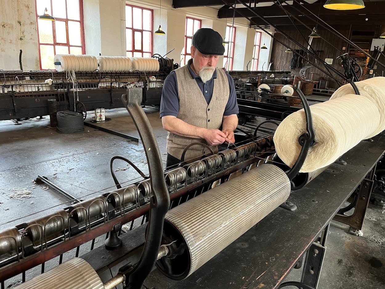 Leeds Industrial Museum's spinning mule: Barrie Mackwell demonstrates how the newly-repaired spinning mule at Leeds Industrial Museum was used to spin fibres into yarn.