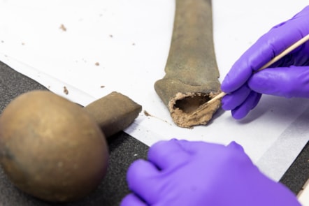Conservator Bethan Bryan works on the Leadburn sword. Image © Duncan McGlynn (2)