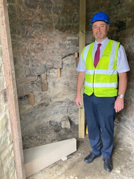 Cllr Bradley at the laying of the first new stone step