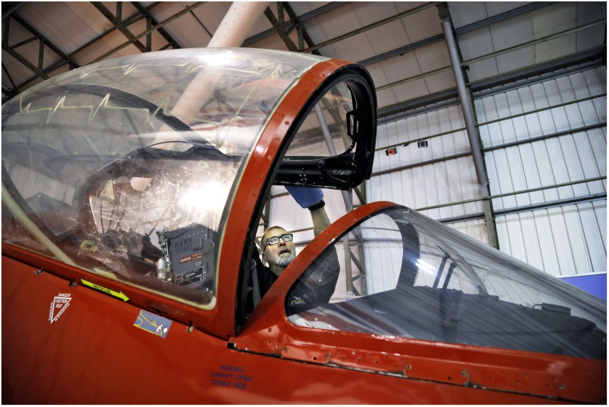 Principal Conservator, Stuart McDonald cleans a Red Arrows Hawk at the National Museum of Flight. Image (c) Paul Dodd (3)