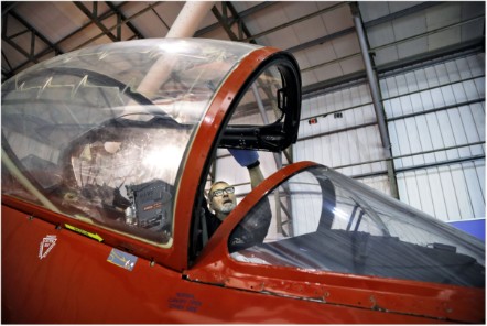 Principal Conservator, Stuart McDonald cleans a Red Arrows Hawk at the National Museum of Flight. Image (c) Paul Dodd (3)