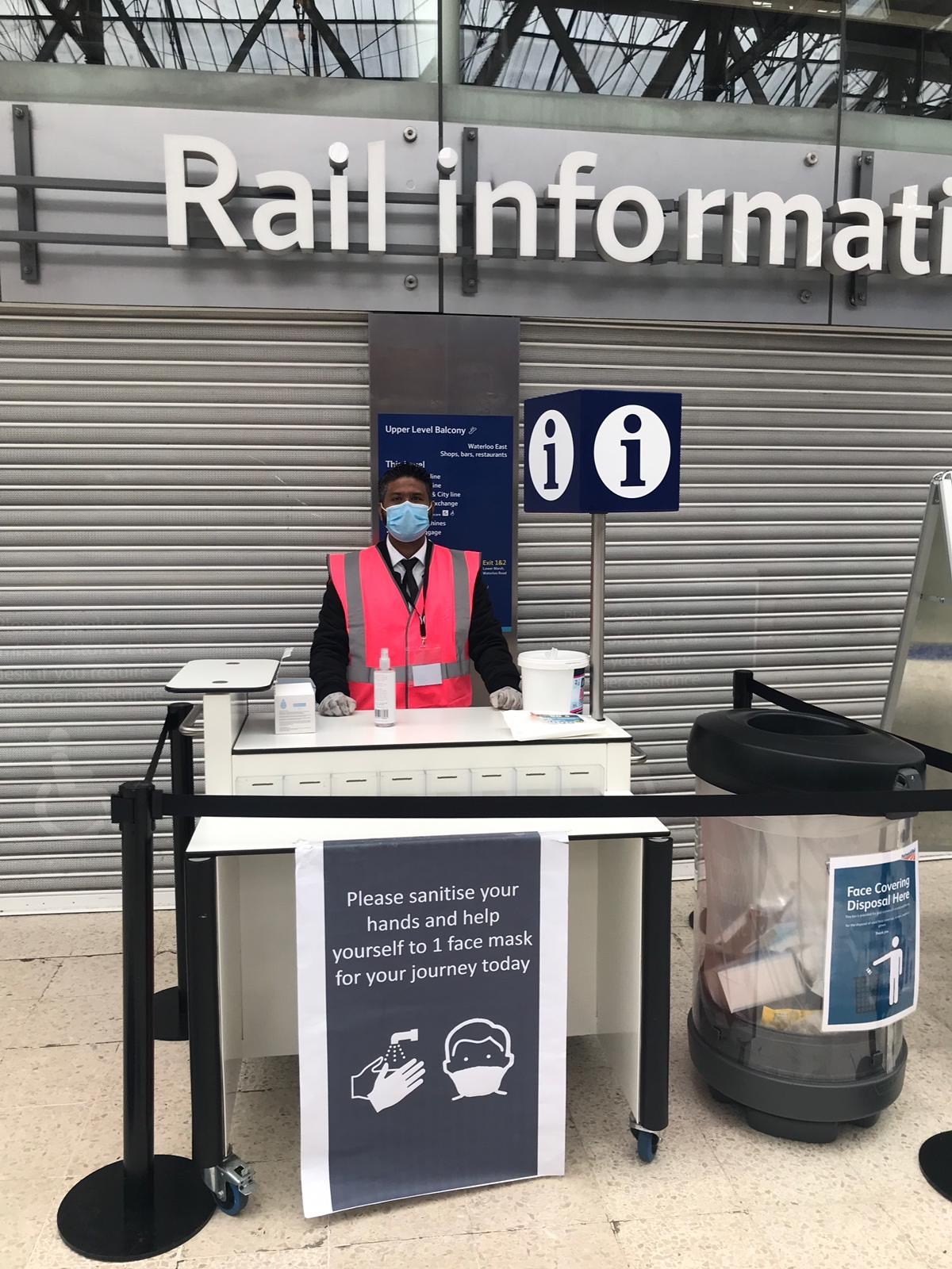 Free face coverings being handed out at London Waterloo station: Credit: Network Rail