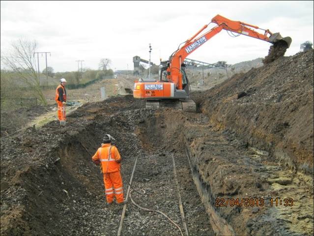 Excavating the Up fast line Hatfield colliery landslip 22.4.13: line whch was moved and buried by lanslip at Hatfield colliery in Feb 2013