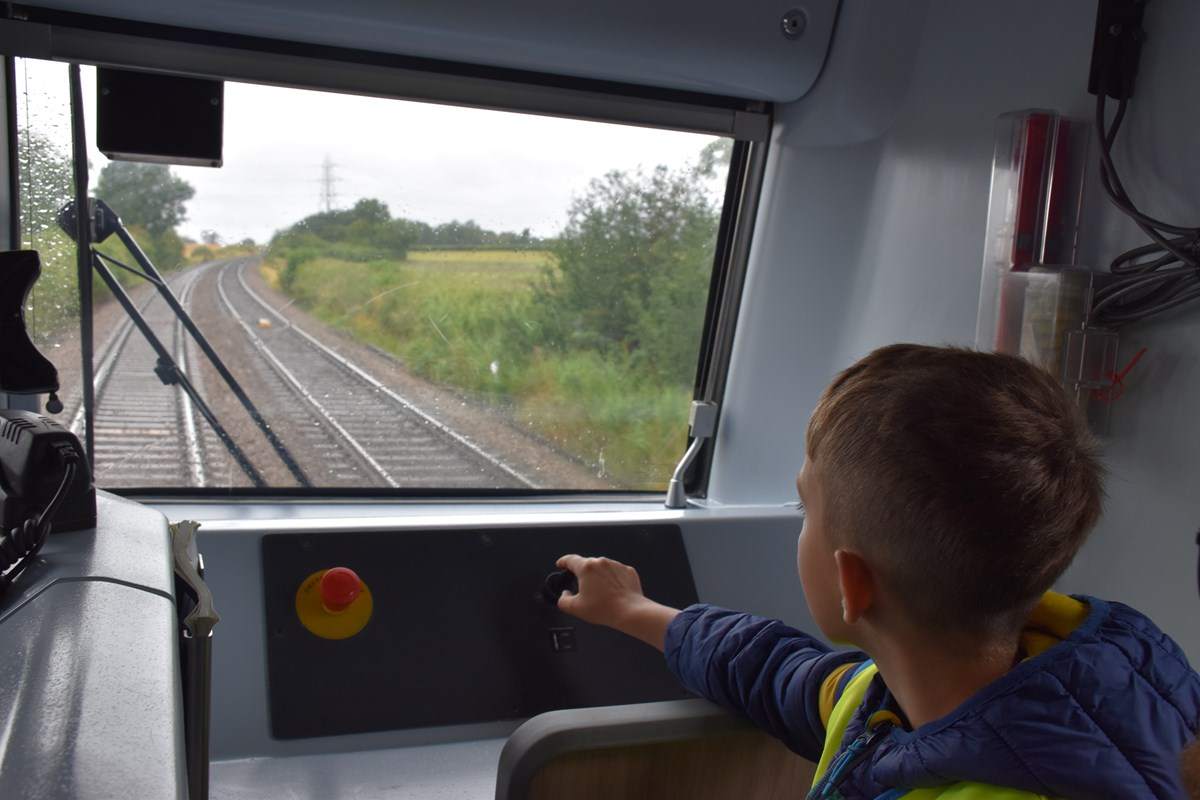 Ernest sounding the horn as they pass a 'whistle board'